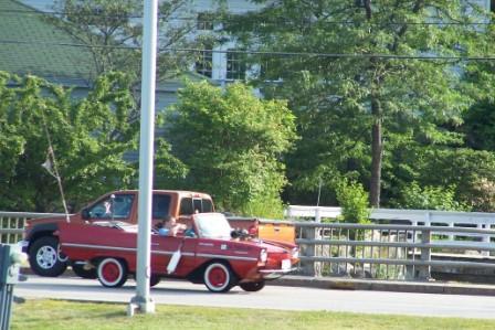 driving_boat_car_on_land
